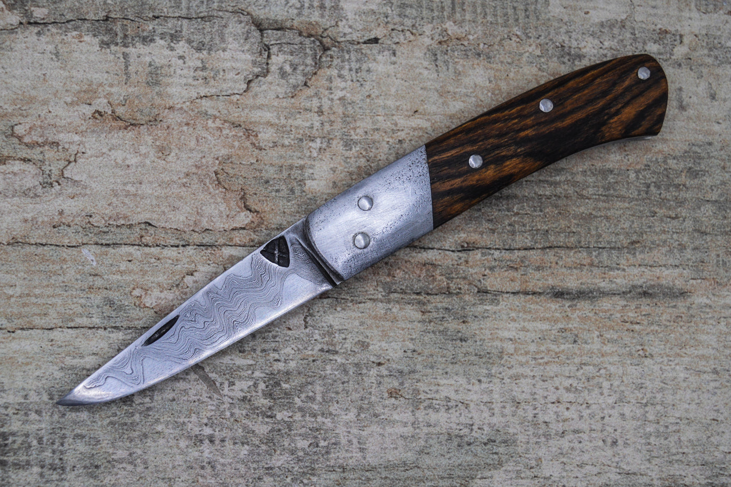 Hand-forged Folding Knife / Pattern-welded blade / Wrought Iron bolsters & Bocote Scales / Heavy duty slipjoint / Non-locking UK Legal Carry