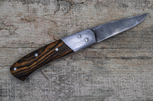 Hand-forged Folding Knife / Pattern-welded blade / Wrought Iron bolsters & Bocote Scales / Heavy duty slipjoint / Non-locking UK Legal Carry