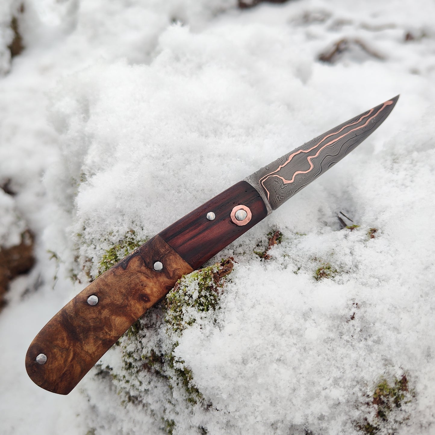 Hand-forged slipjoint folding knife / Pattern-welded Go-Mai Copper Damascus Blade / Copper Liners / Bog Yew and Ash Burl Scales