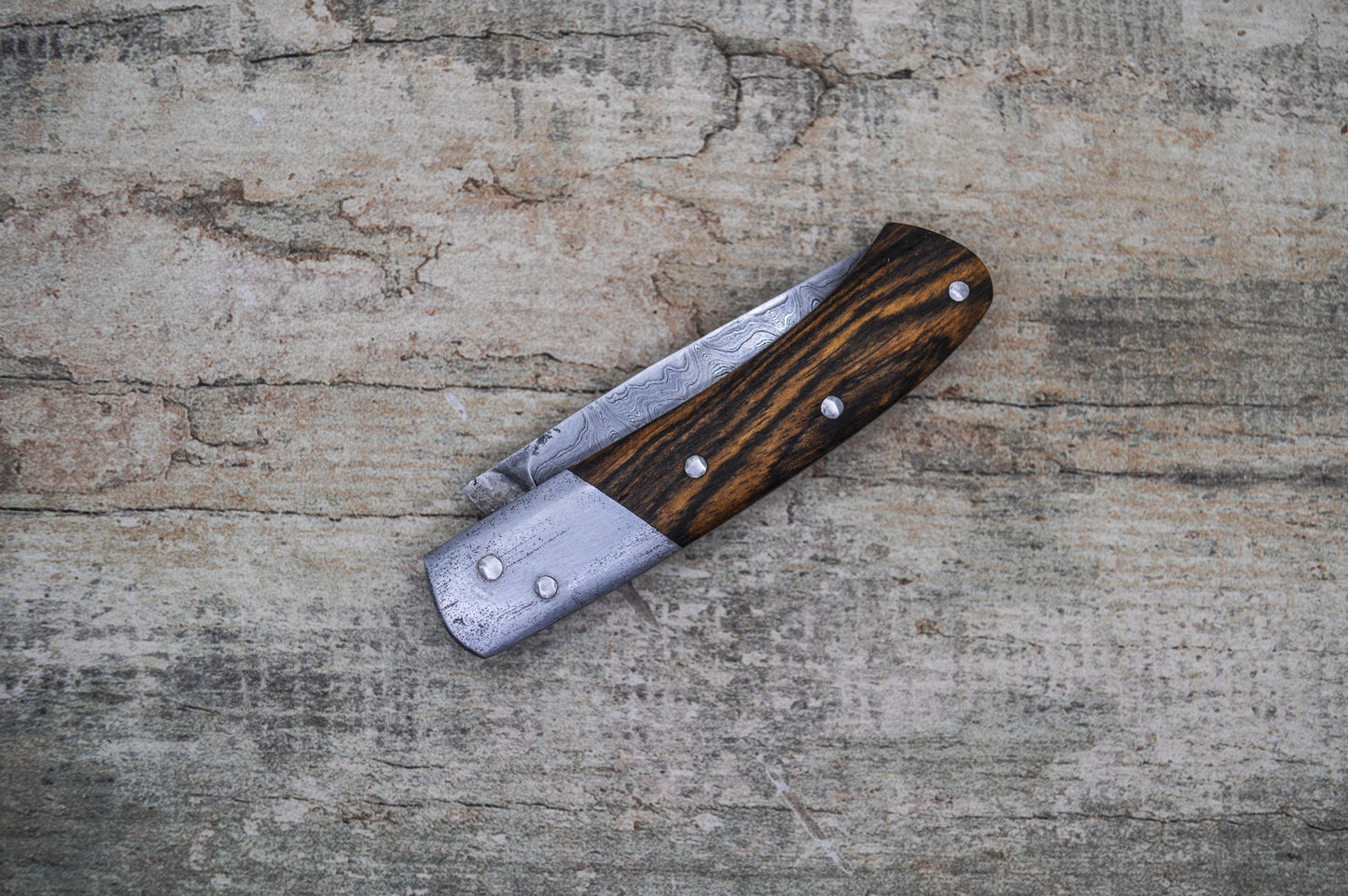 Hand-forged Folding Knife / Pattern-welded blade / Wrought Iron bolsters & Bocote Scales / Heavy duty slipjoint / Non-locking UK Legal Carry