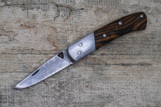Hand-forged Folding Knife / Pattern-welded blade / Wrought Iron bolsters & Bocote Scales / Heavy duty slipjoint / Non-locking UK Legal Carry