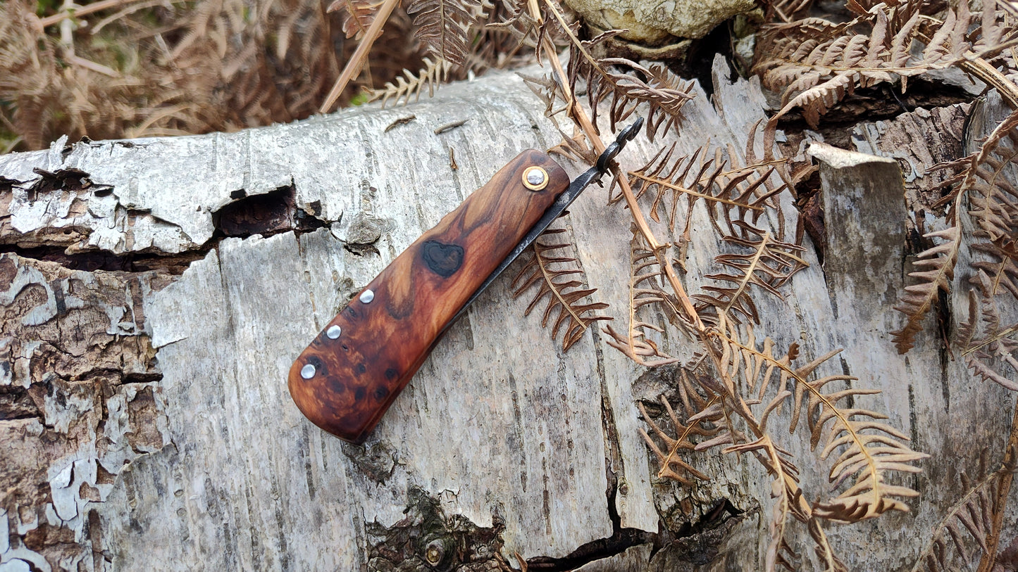 Hand-forged Friction Folder  / 52100 Carbon Steel blade / Yew Burl and mahogany scales / UK Legal Carry