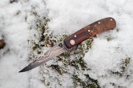 Hand-forged slipjoint folding knife / Pattern-welded Go-Mai Copper Damascus Blade / Copper Liners / Bog Yew and Ash Burl Scales