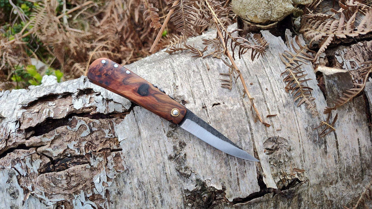 Hand-forged Friction Folder  / 52100 Carbon Steel blade / Yew Burl and mahogany scales / UK Legal Carry